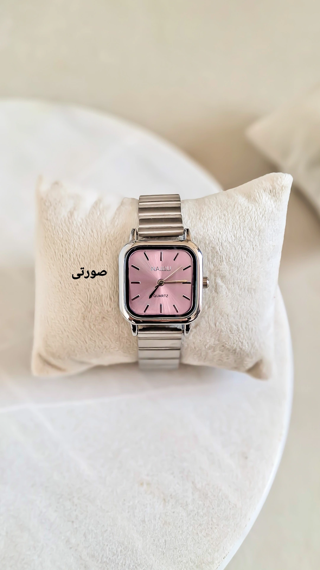 تخفیف فوق العاده ساعت دخترانه مدل نایدو کد5 رنگ سیلور صفحه صورتی کد 1457